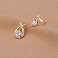Oorbellen met gouden kruis en zirconia
