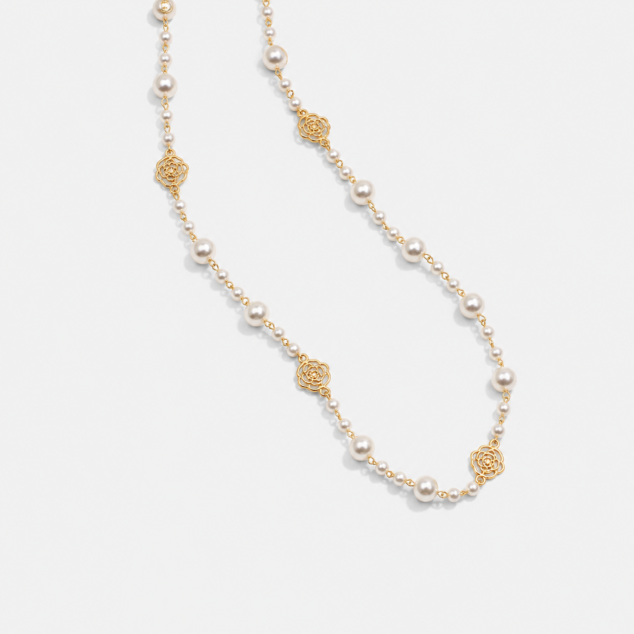 Elegante gouden ketting met parels