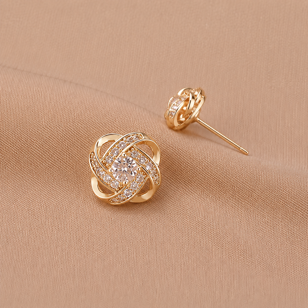 Gouden spiralen oorbellen met kristallen